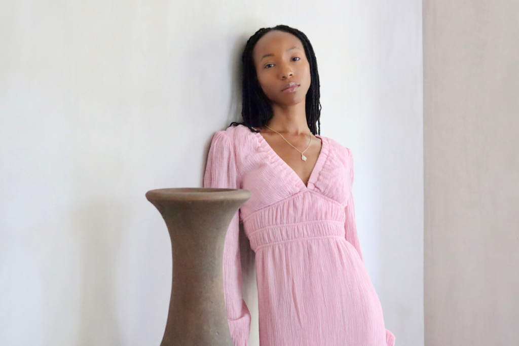 Soft natural light profile photo of Lunah Moore with soft shadows