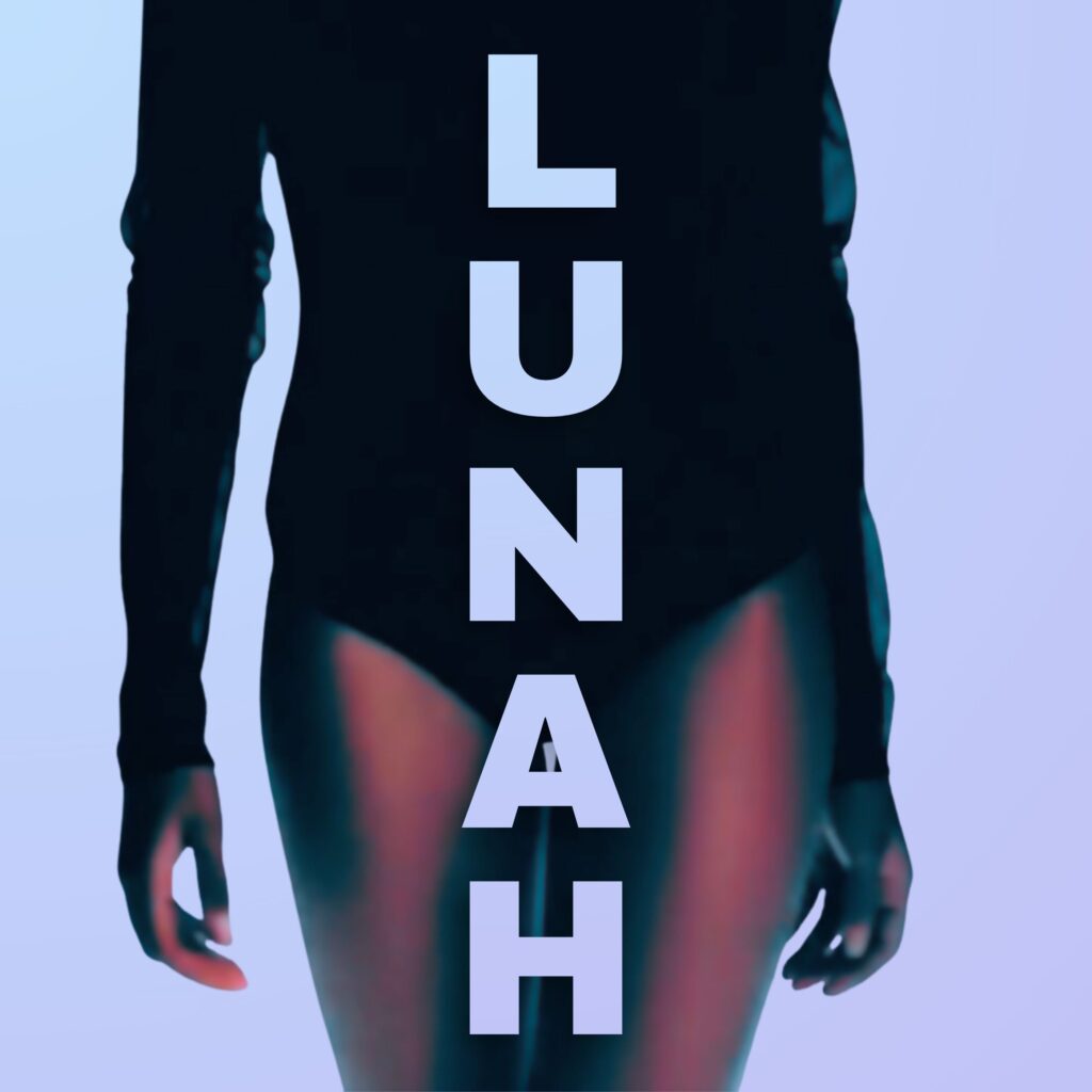 Lunah Moore cropped from the chest to just above her knees